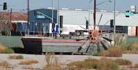 Paddleboat and wheel setpiece abandoned on the backlot (September 2010, (c) theStudioTour.com) - Click to enlarge Paddleboat and wheel setpiece abandoned on the backlot (September 2010, (c) theStudioTour.com)