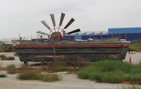 Paddleboat and wheel setpiece abandoned on the backlot (September 2010, (c) theStudioTour.com) - Click to enlarge Paddleboat and wheel setpiece abandoned on the backlot (September 2010, (c) theStudioTour.com)