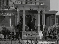Harvey - Stills - 3 - Still from Harvey - James Stewart as Elwood P. Dowd outside his home on Colonial Street (1950)