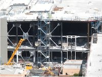 Transformers show building nearing completion - ride vehicle guide track can be seen on the upper level - photo by abovethefirehouse (April 2011) - Click to enlarge Transformers show building nearing completion - ride vehicle guide track can be seen on the upper level - photo by abovethefirehouse (April 2011)