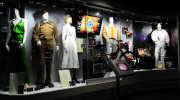 Universal Pictures: On Screen - Academy award nominated wardrobe from Atonement (2007), military props from All Quiet on the Western Front (1930), Steve Carell's bike and wardrobe from The 40 Year Old Virgin (2005), the Book of Who from Dr. Seuss’ The Grinch Who Stole Christmas (2000), the communicator prop from E.T., The Extra Terrestrial (1982) and Kevin Bacon's space suit from Apollo 13 (1995). - Click to enlarge Universal Pictures: On Screen - Academy award nominated wardrobe from Atonement (2007), military props from All Quiet on the Western Front (1930), Steve Carell's bike and wardrobe from The 40 Year Old Virgin (2005), the Book of Who from Dr. Seuss’ The Grinch Who Stole Christmas (2000), the communicator prop from E.T., The Extra Terrestrial (1982) and Kevin Bacon's space suit from Apollo 13 (1995).
