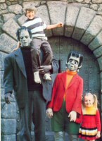 Frankenstein's Monster and Baby Frankenstein welcome Tour visitors to the Entertainment Center. A friendly favourite of children, the Monster is recreated from Universal's 1931 horror classic.
(From Inside Universal Studios, 1978) - Click to enlarge Frankenstein's Monster and Baby Frankenstein welcome Tour visitors to the Entertainment Center. A friendly favourite of children, the Monster is recreated from Universal's 1931 horror classic.
(From Inside Universal Studios, 1978)