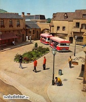 7 - A GlamorTram weaves its way through The Court of Miracles in this posed publicity shot. The tram never actually enters the Court of Miracles. (From Inside Universal Studios, 1968) - click to enlarge 7 - A GlamorTram weaves its way through The Court of Miracles in this posed publicity shot. The tram never actually enters the Court of Miracles. (From Inside Universal Studios, 1968)