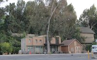 Denver Street from the Earthquake entrance, showing the lack of sets around the tree (Sept 2011) (c) theStudioTour.com - click to enlarge Denver Street - After 2010 - 56 - Denver Street from the Earthquake entrance, showing the lack of sets around the tree (Sept 2011) (c) theStudioTour.com