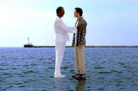 402 - Morgan Freeman and Jim Carrey in Bruce Almighty (2003). In the background is a model of what looks like a lighthouse, designed to give the illusion of a vast expanse of water. - click to enlarge 402 - Morgan Freeman and Jim Carrey in Bruce Almighty (2003). In the background is a model of what looks like a lighthouse, designed to give the illusion of a vast expanse of water.