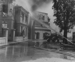 Movie sets burn in a $1 million fire on Universal Studios' backlot on May 15, 1967. Firemen battle roaring flames that raged out of control in studio structures. Photo by Dave Hearst Jr. Photo from the LA Public Library Photo Catalog 