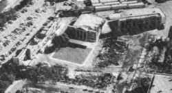 Newspaper photo of the fire damage (source unknown). Click to enlarge the photo.