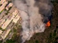 Helicopter view of the brush fire, showing how close it got to the Oakwood Toluca Hills housing complex, from KTLA website video Helicopter view of the brush fire, showing how close it got to the Oakwood Toluca Hills housing complex, from KTLA website video