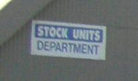 Stock Units Department sign