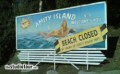 Amity Island billboard at the entrance to the Jaws attraction Amity Island billboard at the entrance to the Jaws attraction