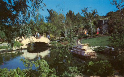 Scenic lagoon on the lower level at Prop Plaza, mid-way spot of the tour at Universal City Studios (Postcard C24080, 1968)
