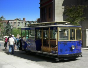 VIP Experience tram dropping guests off at Courthouse Square, 2006