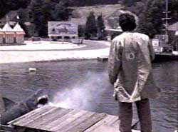 Still from Fade in to Murder at Jaws Lake name=