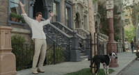 Bruce Almighty - 4 - Jim Carrey and Buster the dog on Brownstone Street (still from DVD release)