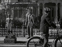 Harvey - Stills - 1 - Still from Harvey - James Stewart as Elwood P. Dowd outside his home on Colonial Street (1950))