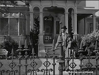 Harvey - Stills - 2 - Still from Harvey - James Stewart as Elwood P. Dowd outside his home on Colonial Street (1950)