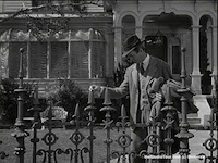 Harvey - Stills - 4 - Still from Harvey - James Stewart as Elwood P. Dowd outside his home on Colonial Street (1950)