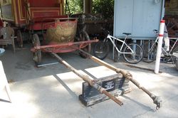 Chariot stored under an awning beyond Park Lake (March 2008)